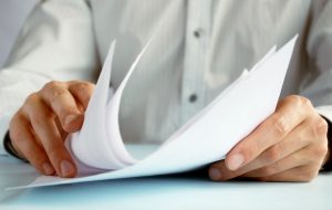 Man handling official papers